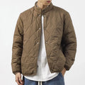 Men's black lengthened winter jacket with loose fit and urban style design
