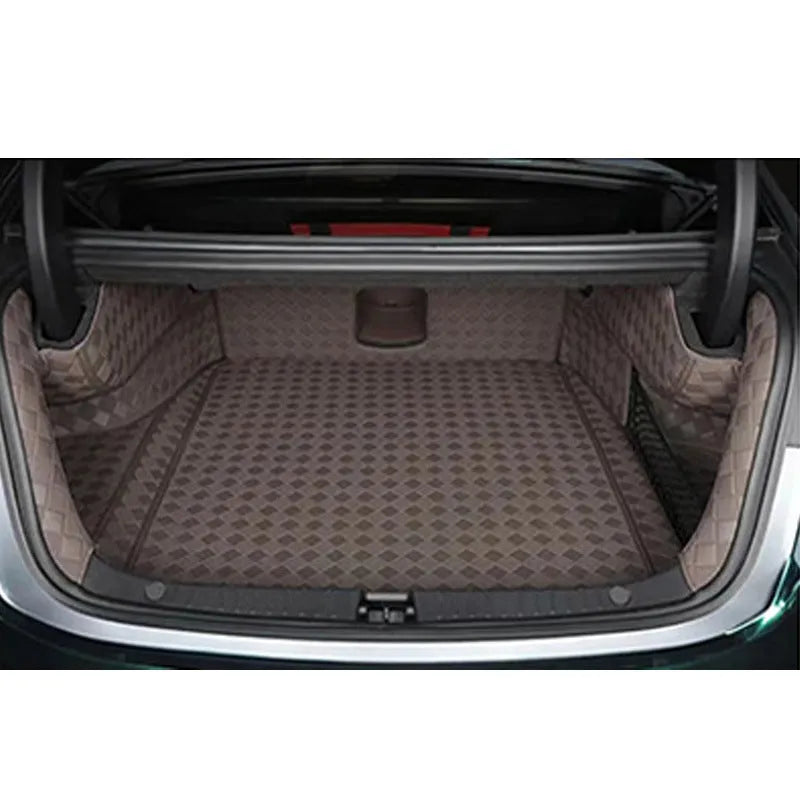 Black leather boot liner mat fitted in the luggage compartment of a Tesla Model Y