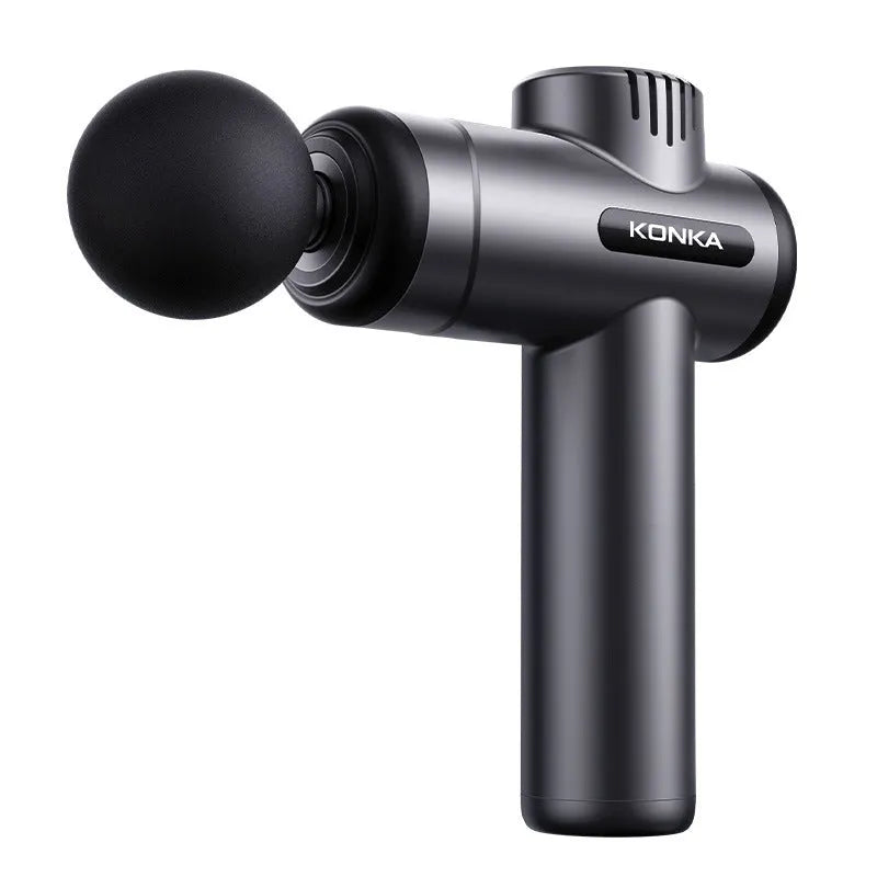 Konka V19 mini electric massage gun in grey colour with multiple attachment heads on a table.