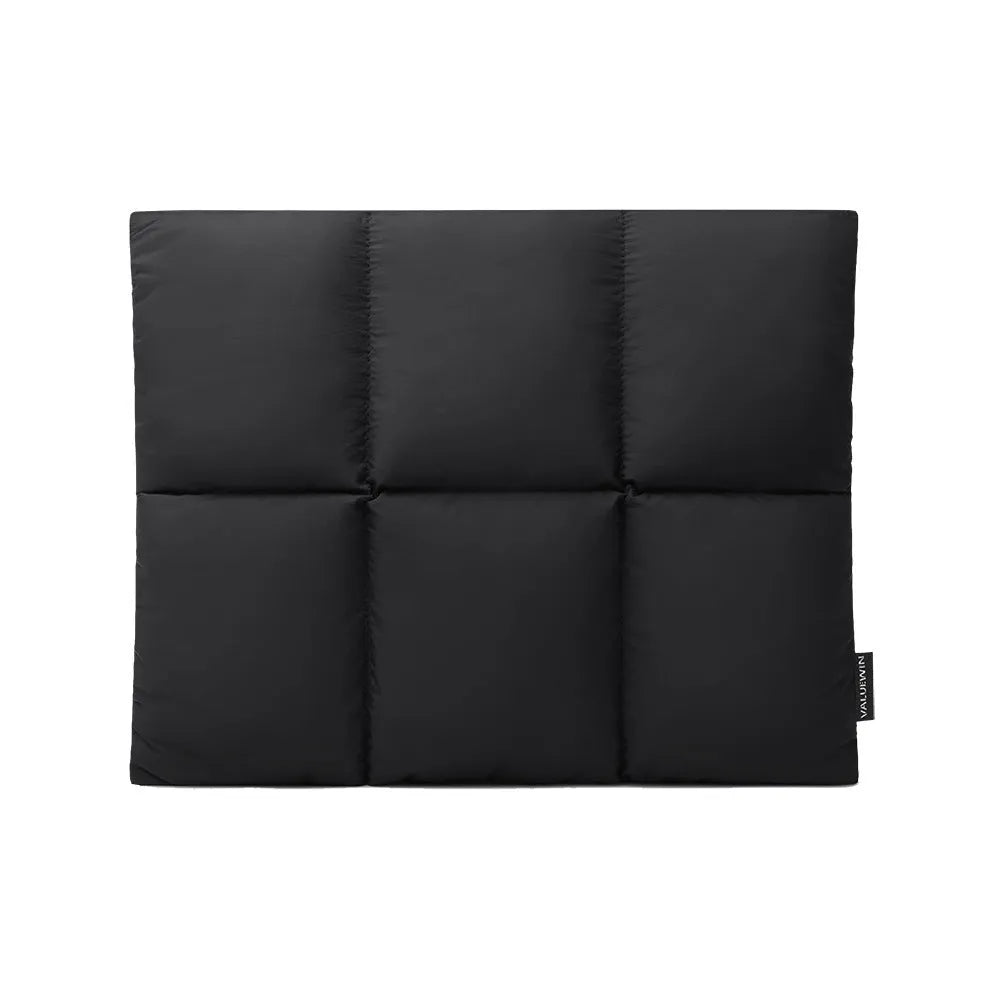 Soft fluffy black polyester laptop sleeve for 13 to 15.6 inch laptops with sewing thread details.
