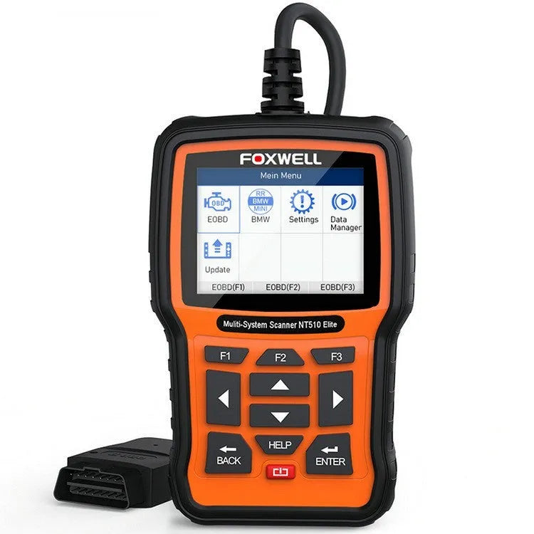 Foxwell NT510 orange and black automotive diagnostic scanner with data cable on workbench