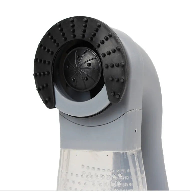 Gray handheld electric pet hair vacuum cleaner with rubber grooming head.