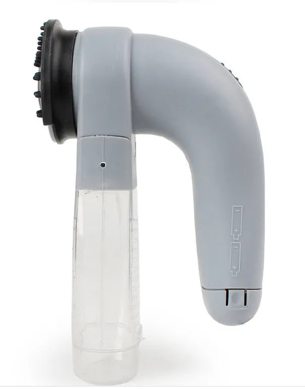 Gray handheld electric pet hair vacuum cleaner with rubber grooming head.