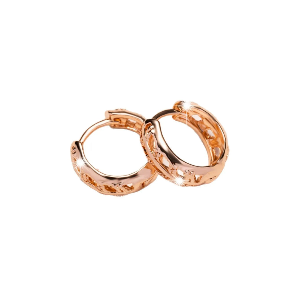 Rose gold leaf-shaped earrings with heart cut-outs, 20mm copper jewellery