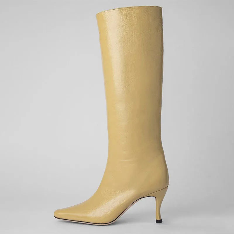 Women's black square toe cowboy ankle boots made from microfiber, shown from the side.