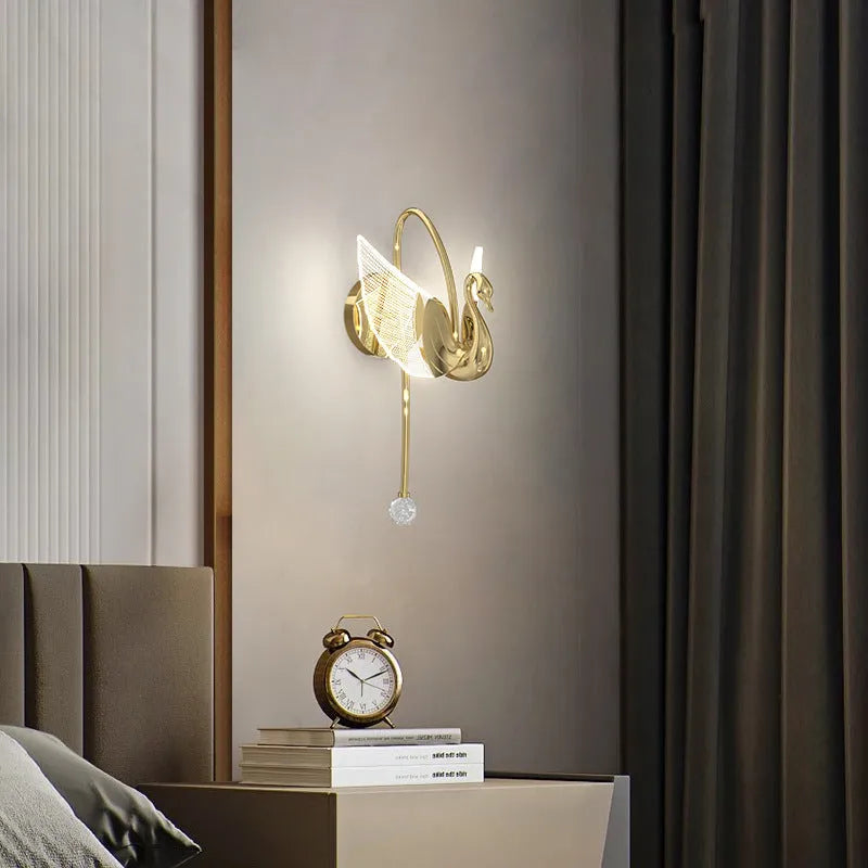 Gold minimalist swan wall lamp with LED lighting and acrylic shade for bedroom bedside use