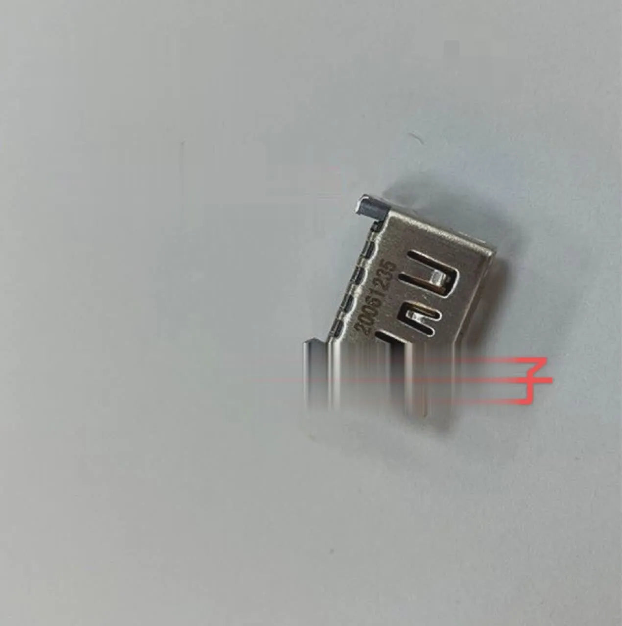 Silver HDMI host interface socket adapter for gaming console connectivity
