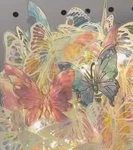Handmade butterfly night lamp with glass shade on raw wood base measuring 12x15cm