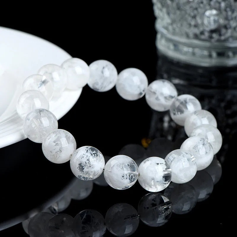 Women's crystal bracelet with matte blizzard-finished round beads and traditional Ruyi Xiangyun design.