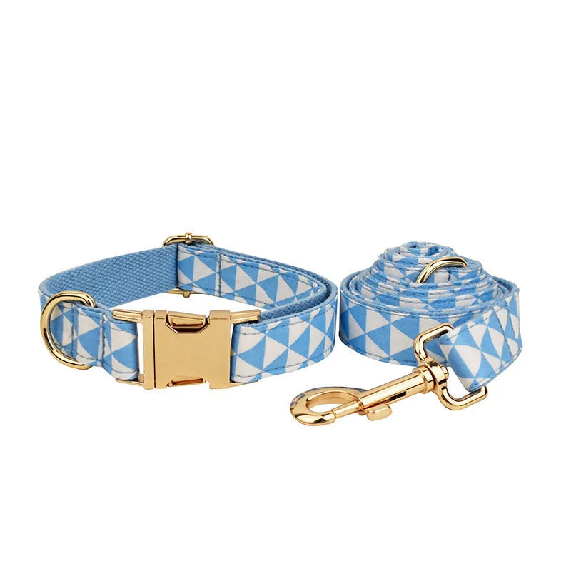 Blue cloth dog collar, leash, vest, and bow four-piece pet accessory set