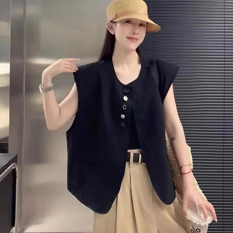 Women's loose-fitting solid colour polyester vest with a pocket, shown in milky white.