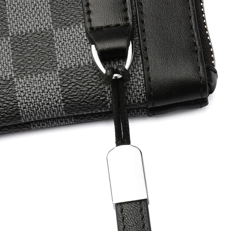 Black men's clutch wallet made of genuine cowhide leather, showing front view.