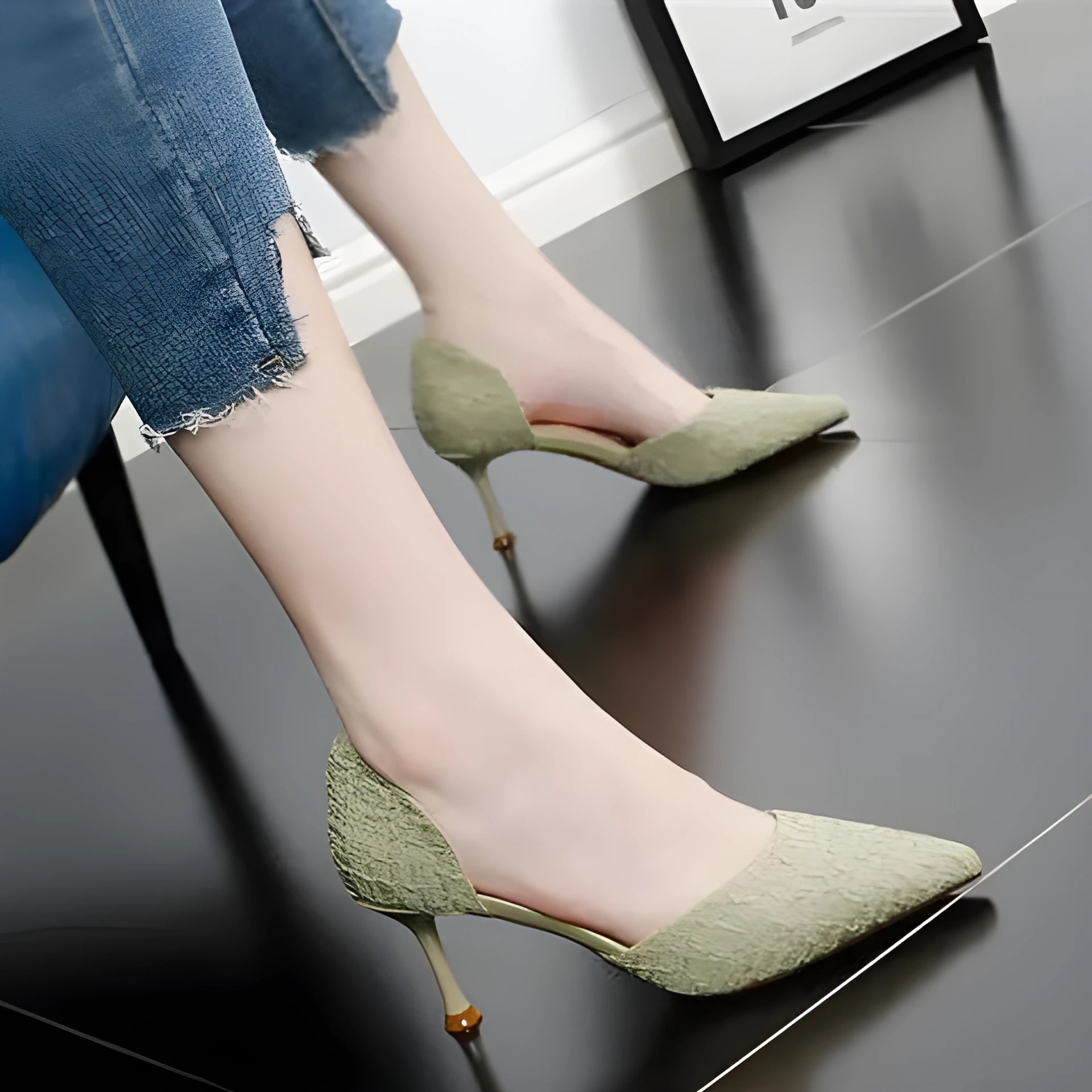 Women's black pointed toe stiletto high heel shoe with PU leather upper
