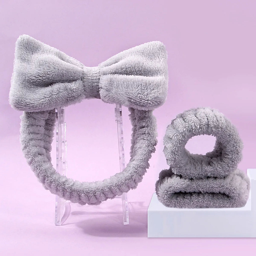 Facial brush and coral fleece hair band set in multiple colours including purple, gray, white, and pink