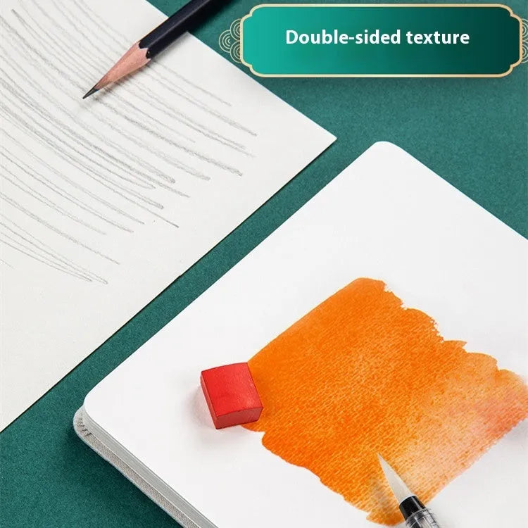 Feiluniao handmade watercolour notebook with decorative cover, 185mm long.
