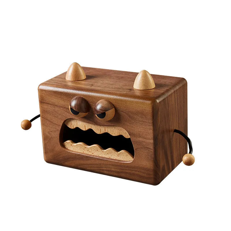 Little Monster cartoon design wooden tissue box in walnut beech finish, 190mm wide.