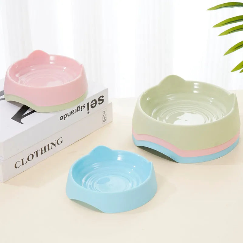 Ceramic dog slow feeder bowl with raised maze pattern in blue, green, or pink colours