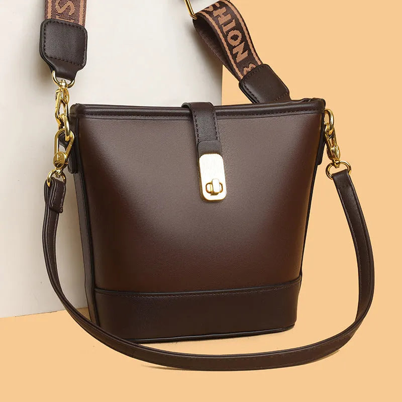 Korean style women's bucket bag in black with double shoulder straps and internal organiser compartments