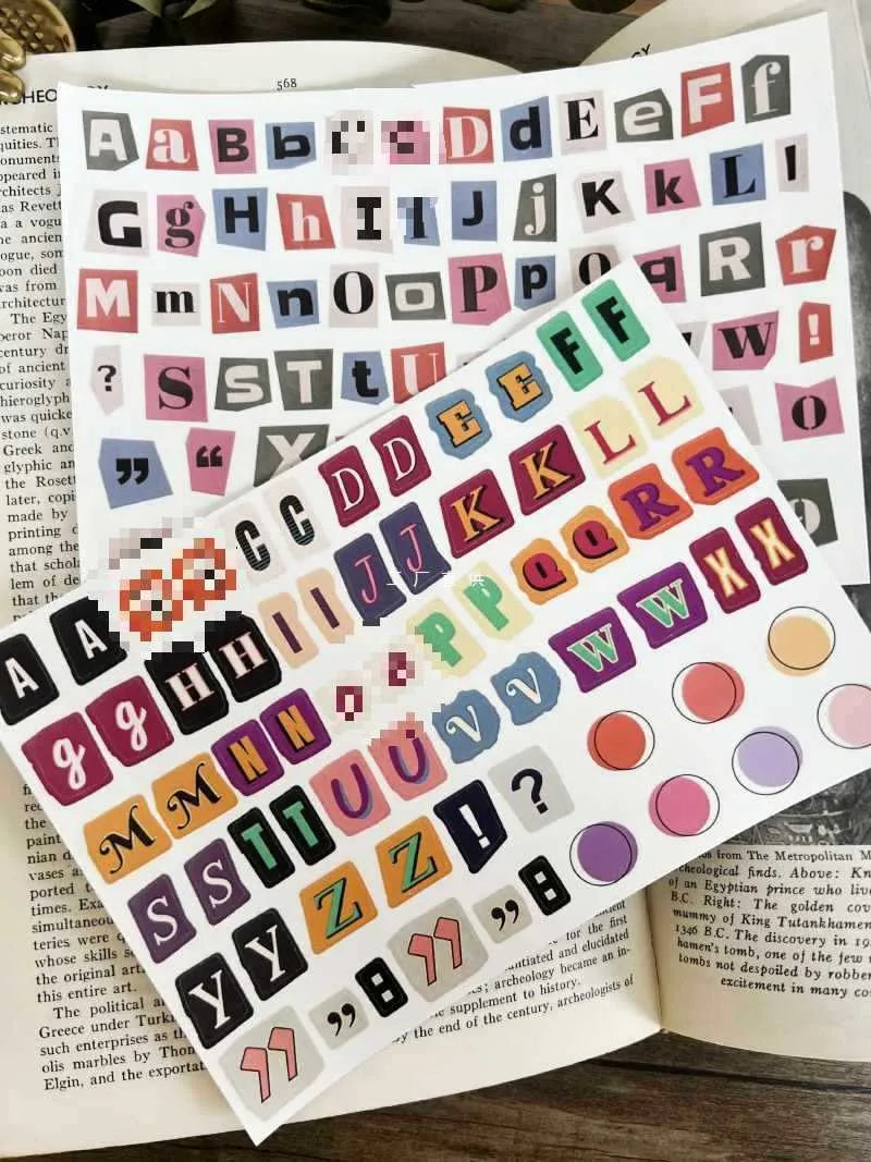 English alphabet and number sticker sheets showing colourful letter sets with cute designs for crafts and labelling