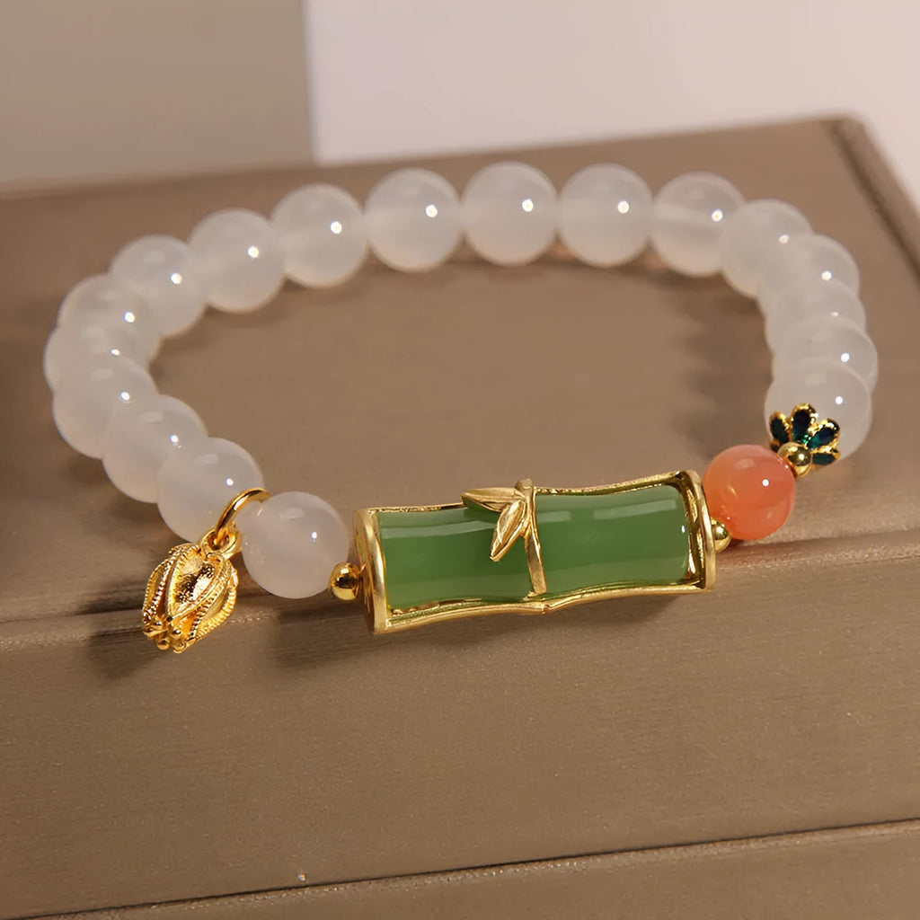 Women's Chinese style bamboo beaded bracelet with white agate jasper charm and natural jade materials