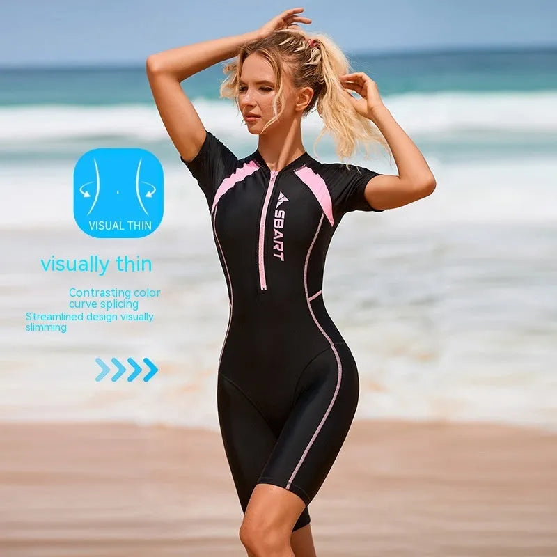 Women's solid colour one-piece swimsuit with short sleeves and built-in chest pad for swimming sports