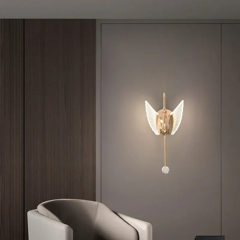 Gold minimalist swan wall lamp with LED lighting and acrylic shade for bedroom bedside use