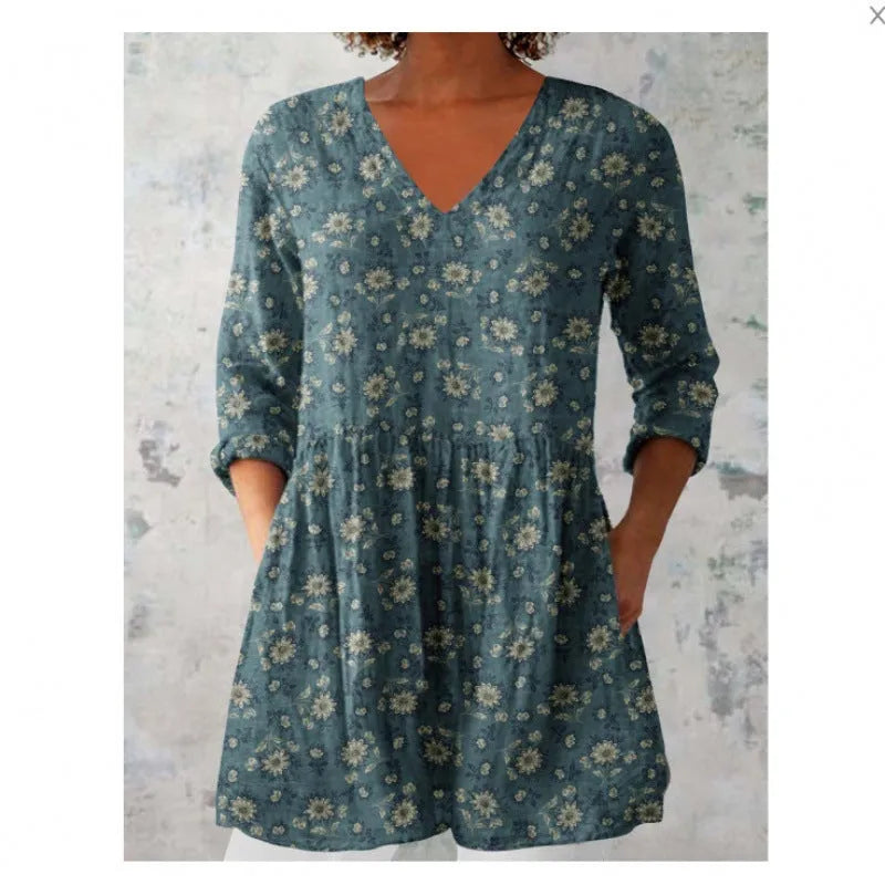 Women's loose fitted printed wave dress with 3/4 sleeves and wide waistband on hanger