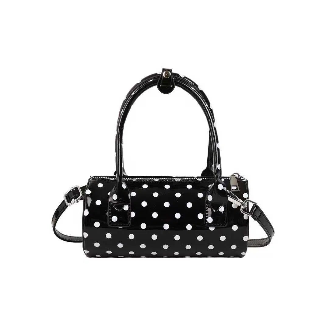 Korean-style cylindrical tote pillow bag in PU leather with stitched seams, black colour, single strap