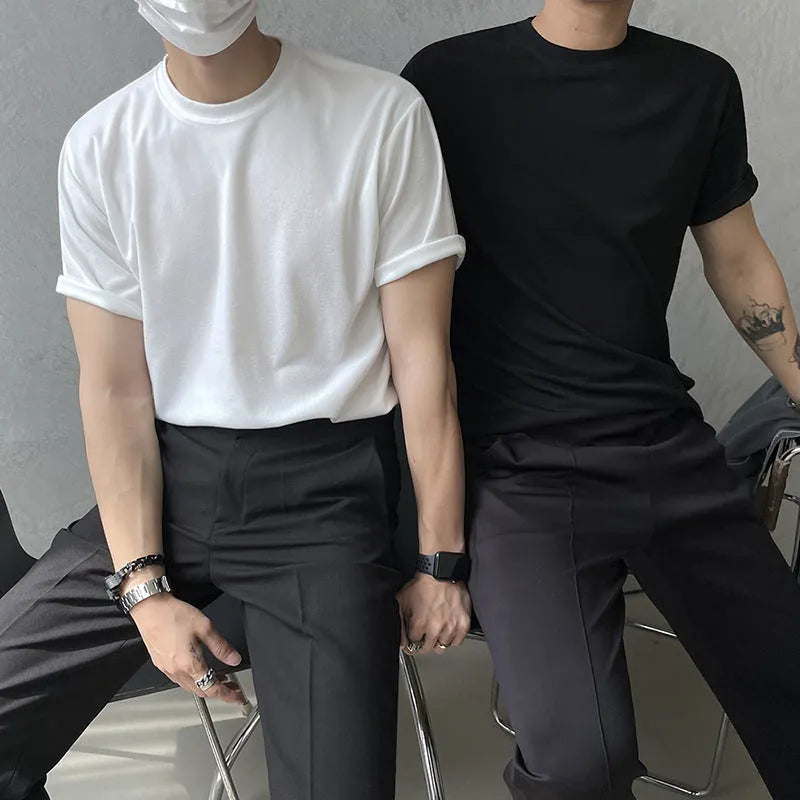 Men's solid color round neck cotton t-shirt in white or black with half sleeves and slim fit