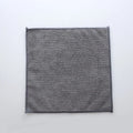 Grey square microfiber kitchen cleaning cloth for oil and decontamination.
