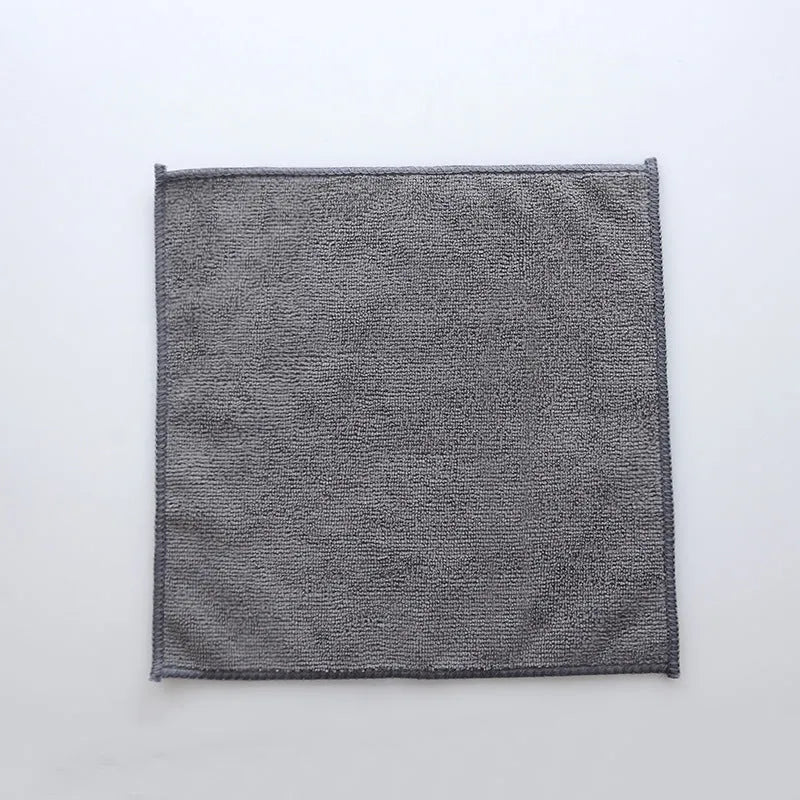 Grey square microfiber kitchen cleaning cloth for oil and decontamination.