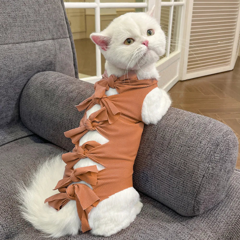 Adjustable lace-up cat sterilisation recovery clothing in polyester fabric showing size and colour options