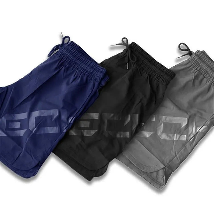 Men's elastic knee-length sports shorts in black colour for running and summer training