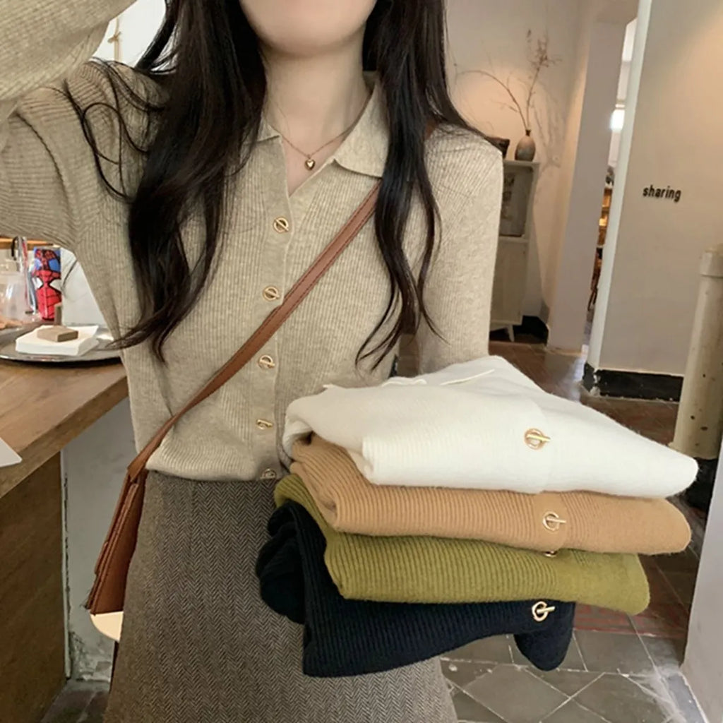 Beige loose fit long-sleeved viscose knitted cardigan for women shown as a layering piece.