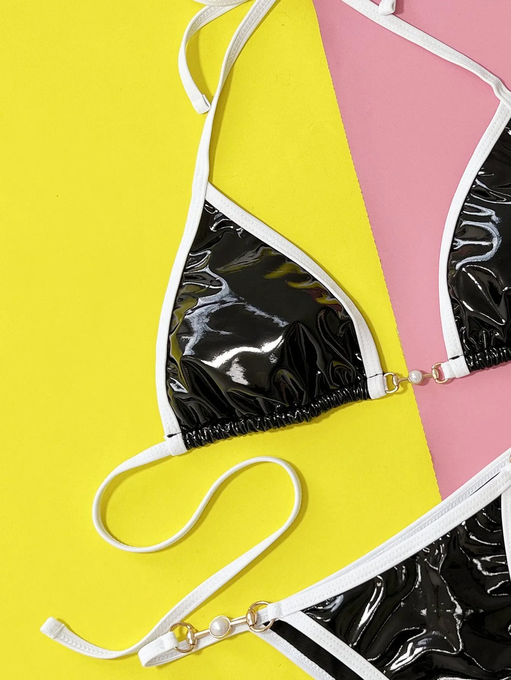 Black solid colour women's bikini swimsuit with brief style.
