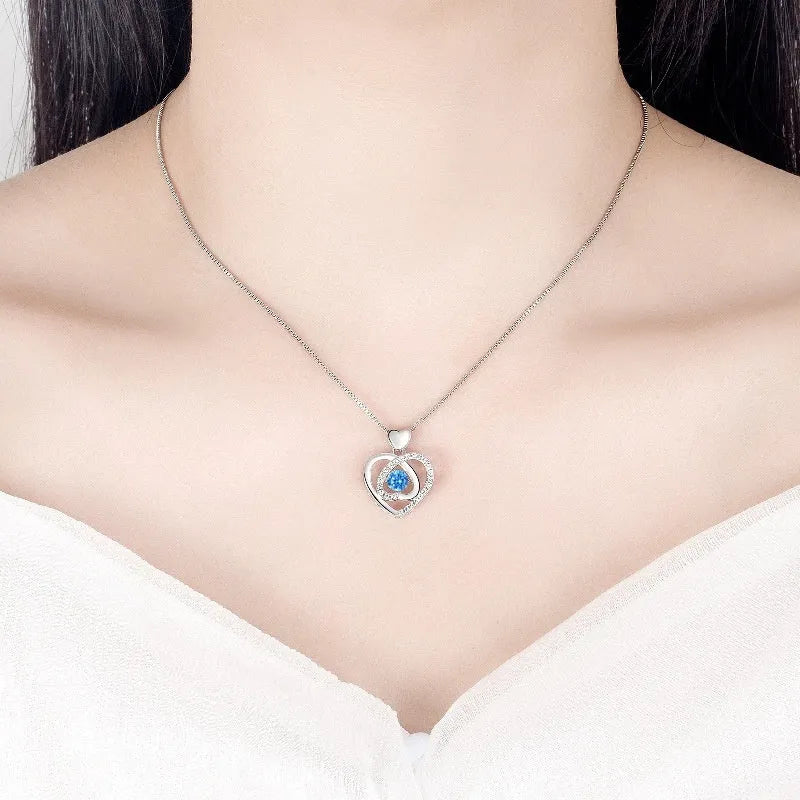 Blue geometric heart necklace and bracelet set with mixed gem inlays on copper chains