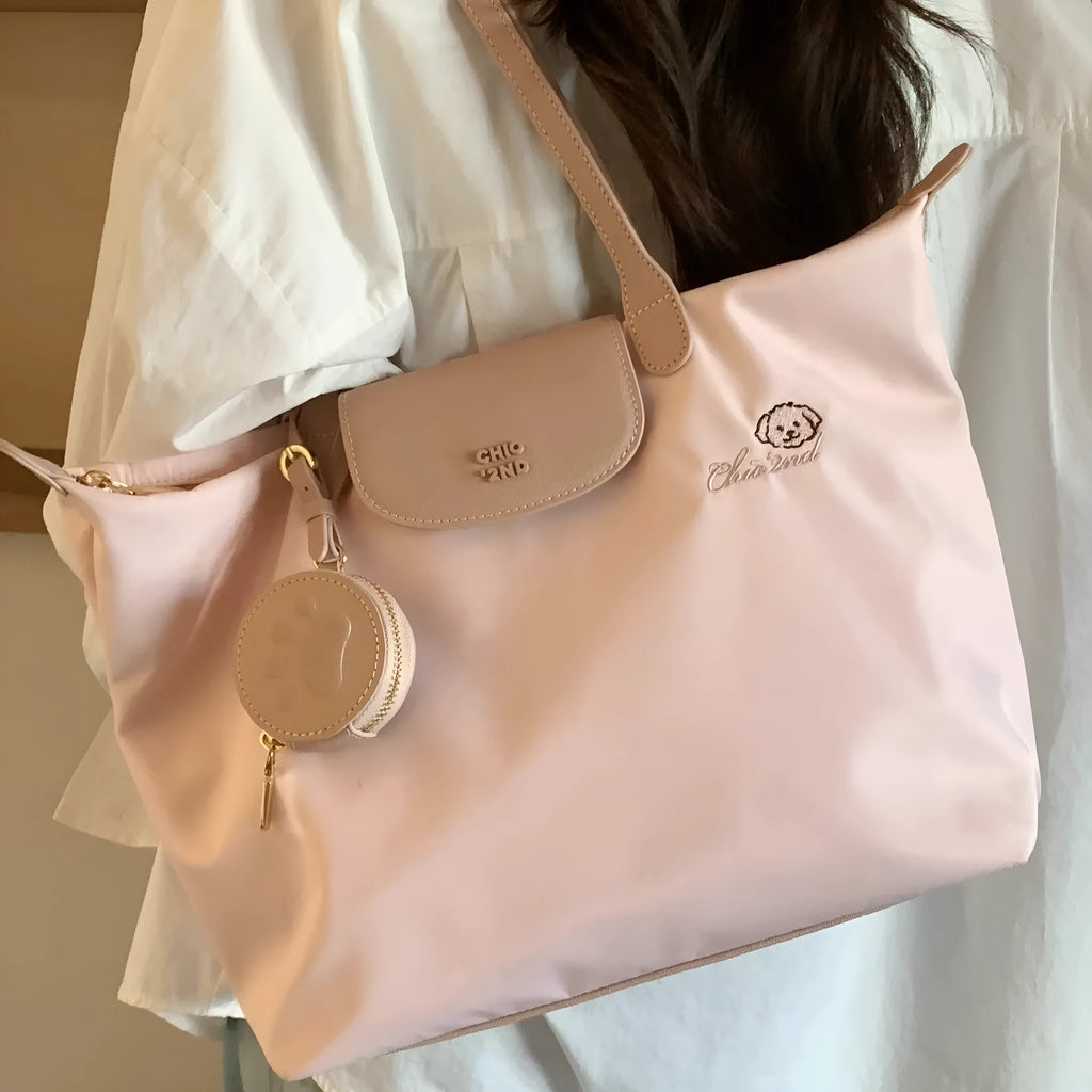 Beige and Pink Oxford cloth tote shoulder bag with sandwich pocket and large capacity.