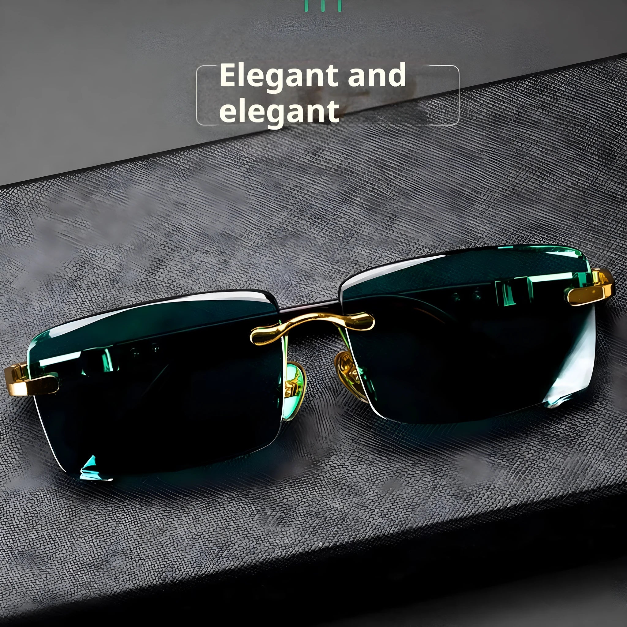 A pair of frameless sunglasses with dark green crystal lenses, shown with a glasses case and cleaning cloth.