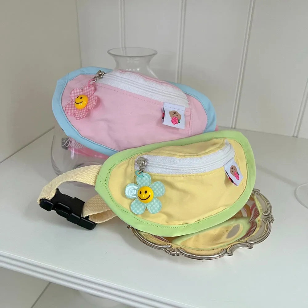 Powder blue and yellow adjustable pet carrier backpack worn on a person's back.