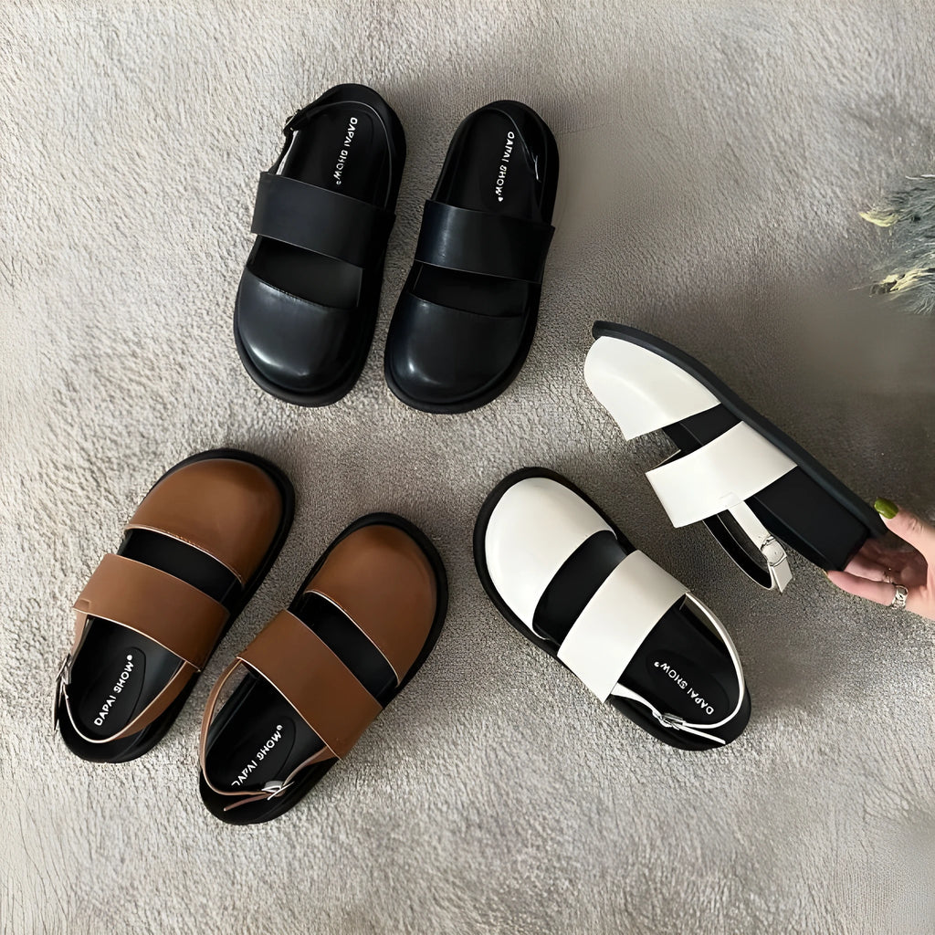Korean style closed toe sandals with an ankle strap buckle in black, brown, and apricot colours.