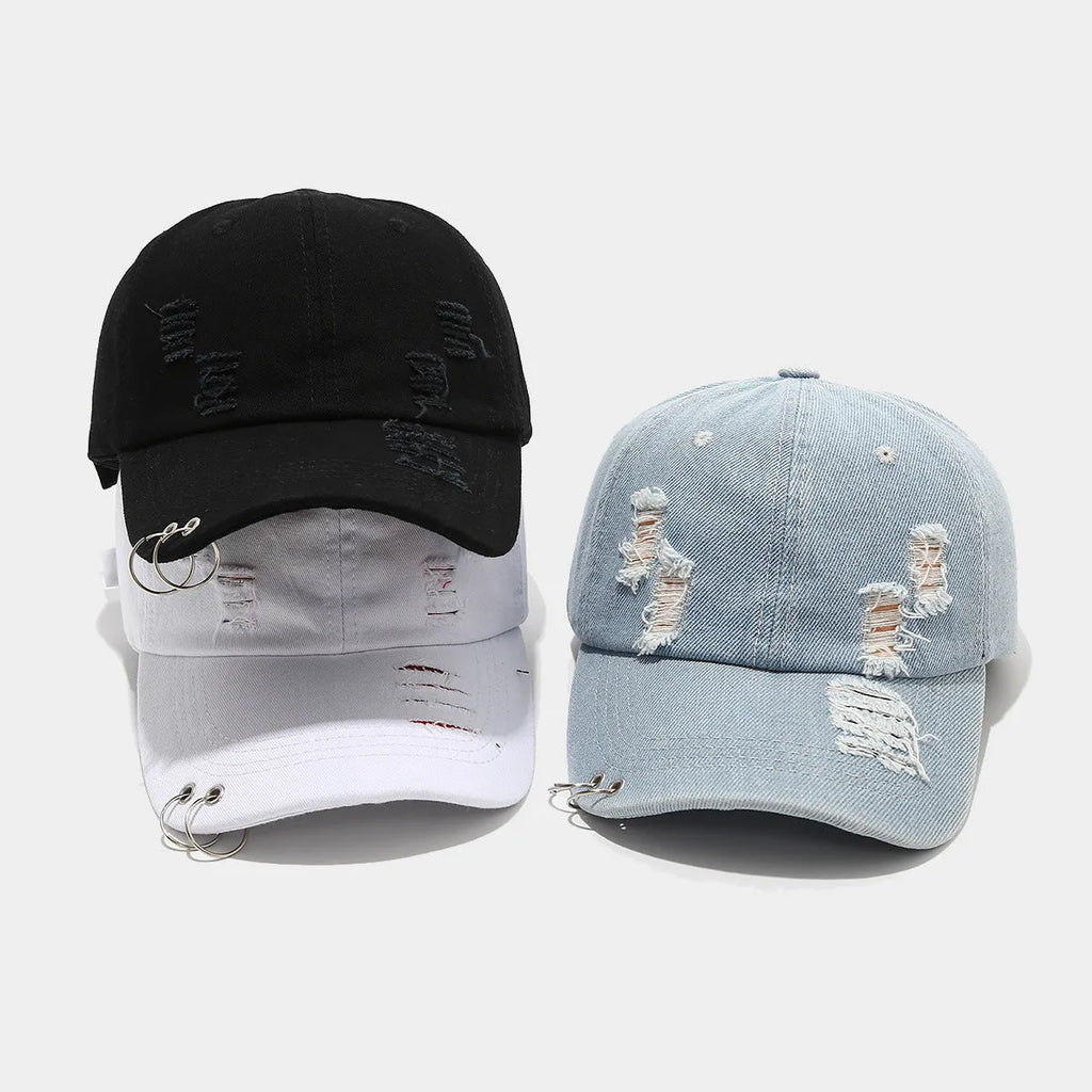 Men's adjustable cotton denim baseball cap in black on a plain background.