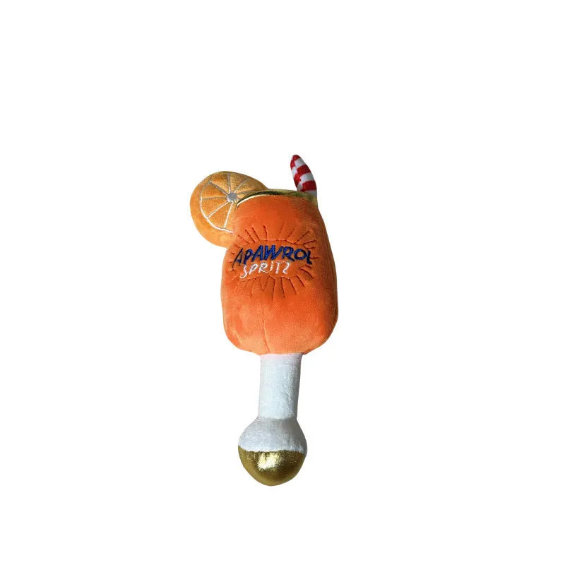 Yellow wine glass shaped plush dog toy with squeaker and teeth cleaning features