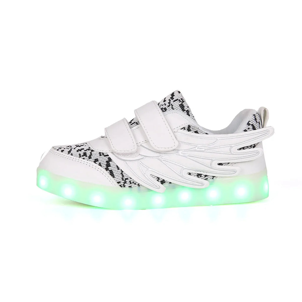 Child wearing plum red USB-rechargeable LED light up sneakers with colourful flashing lights.