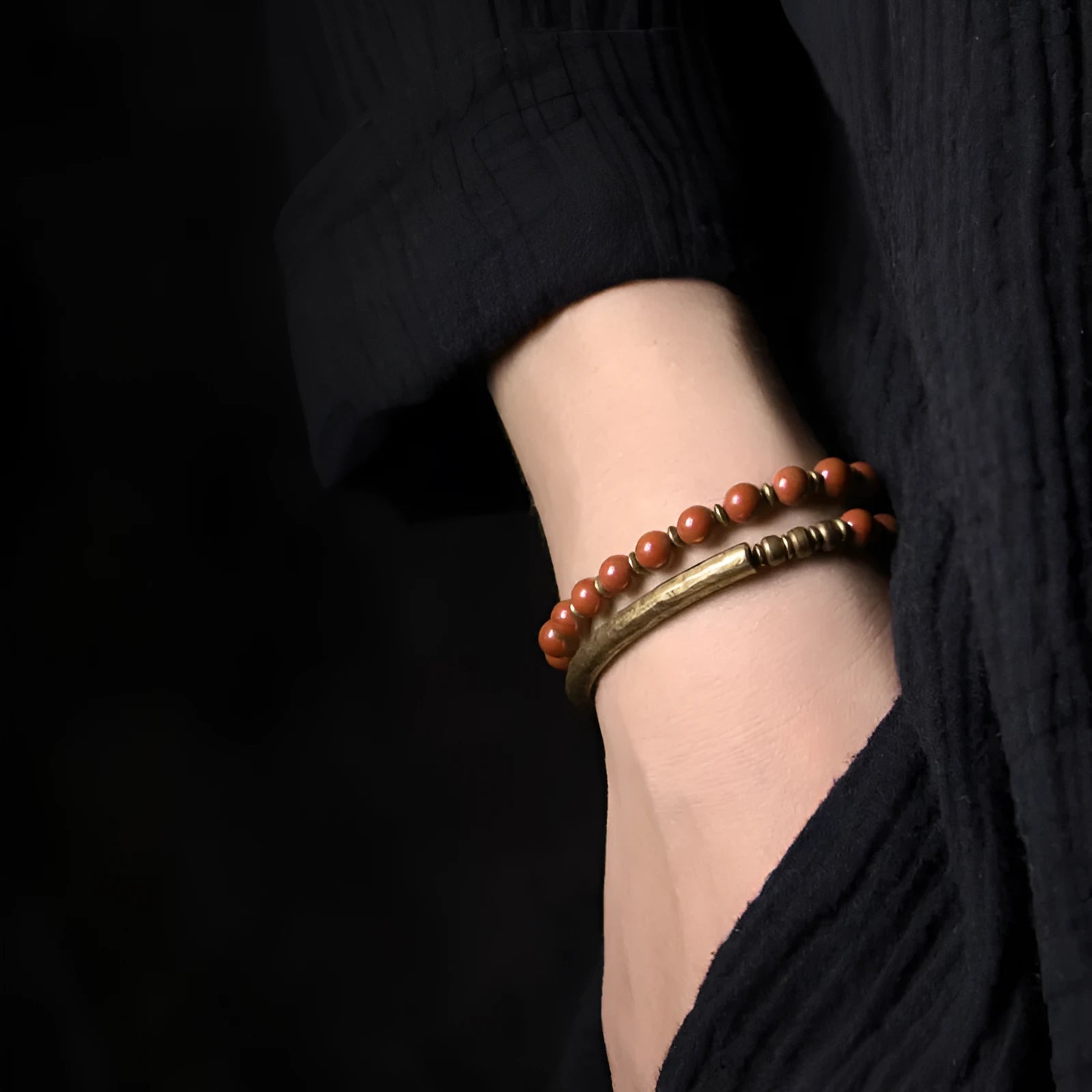 Layered retro ethnic bracelet with agate beads and brass accents showing colour options