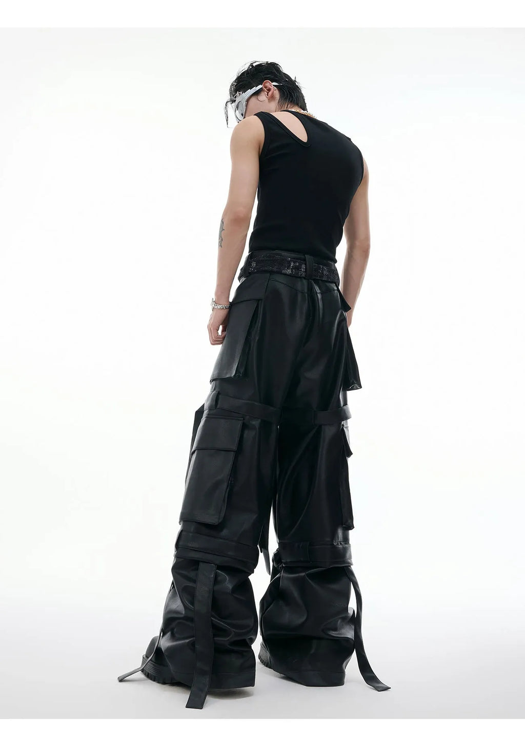 Black loose fit retro trousers with quilted stitching detail and multiple pockets