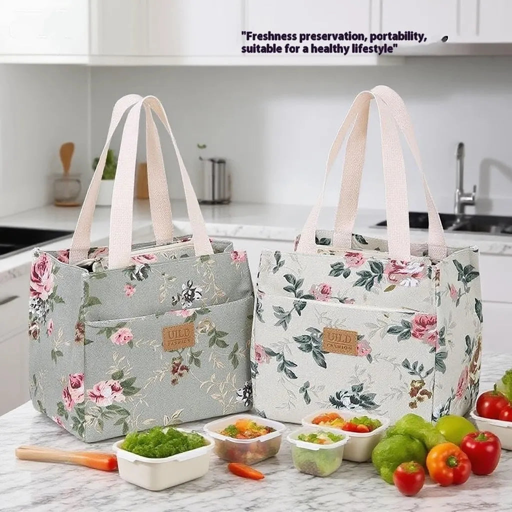 Women's printed canvas handbag with aluminium frame in multiple floral and animal print designs