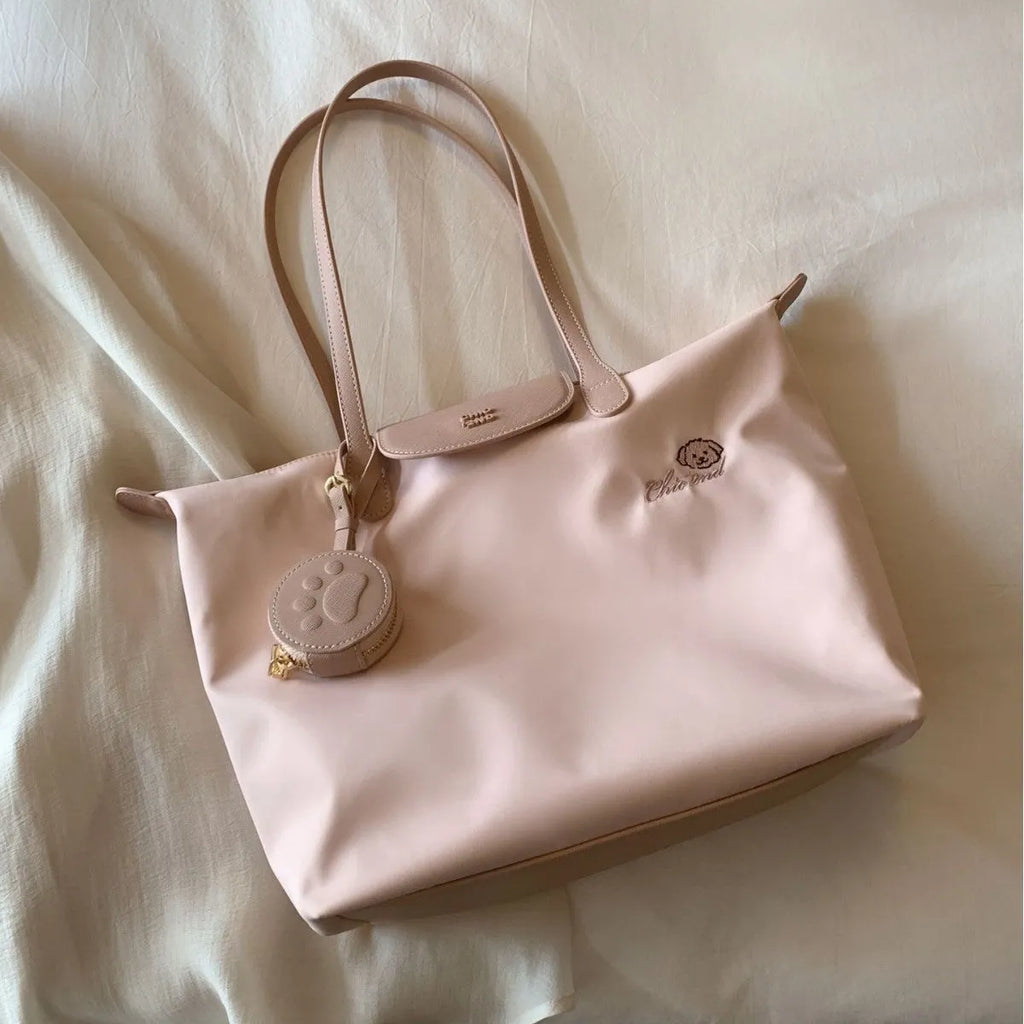 Beige and Pink Oxford cloth tote shoulder bag with sandwich pocket and large capacity.