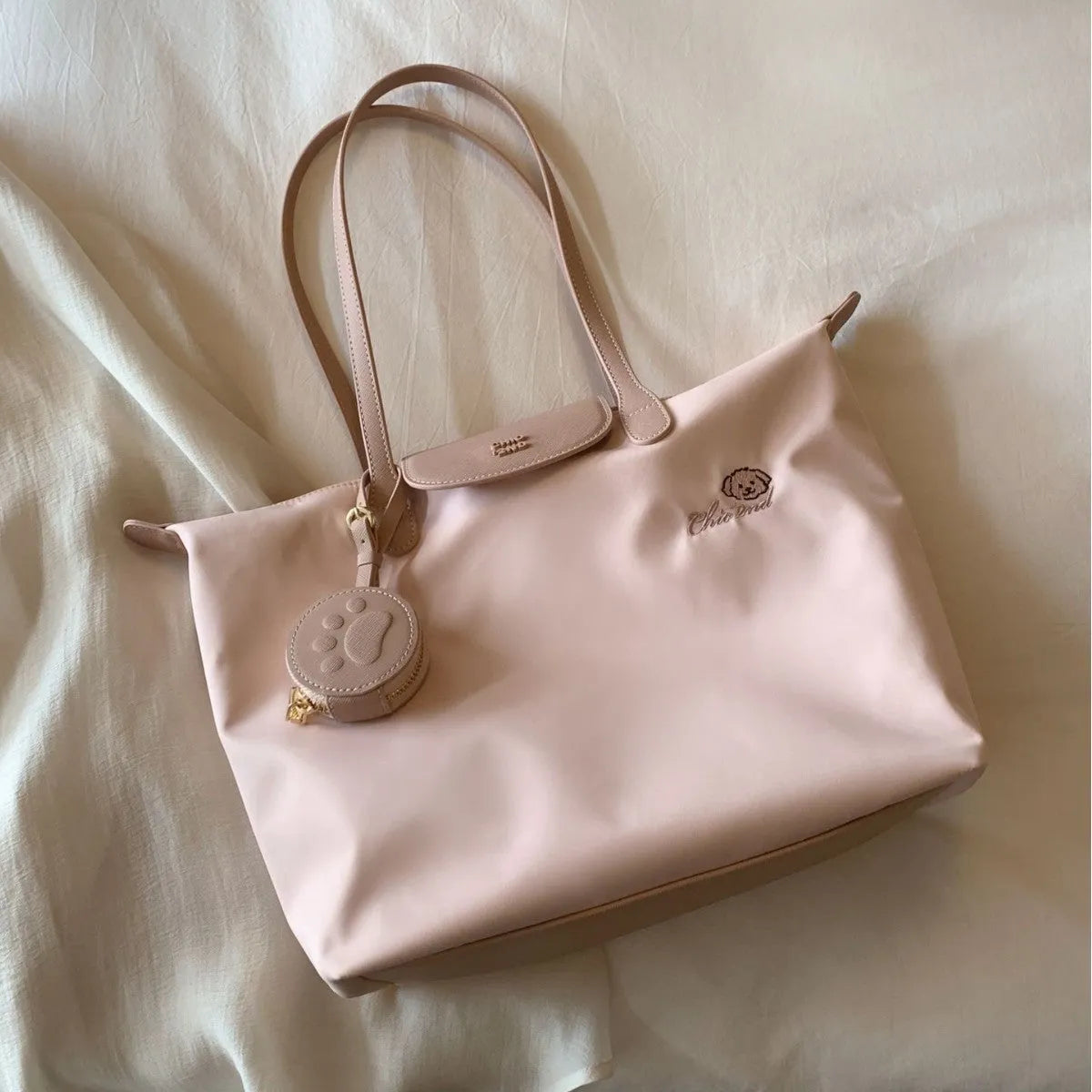 Beige and Pink Oxford cloth tote shoulder bag with sandwich pocket and large capacity.