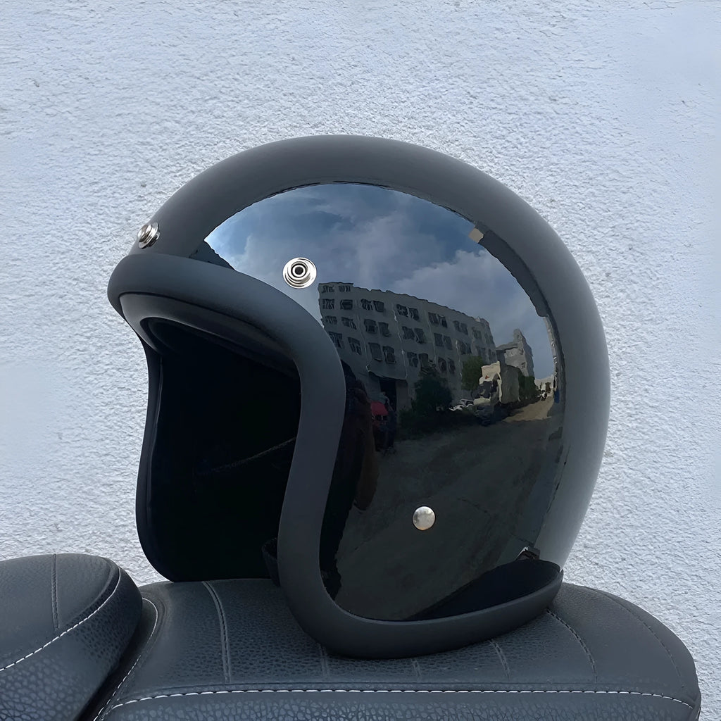 A cement grey retro-style half motorcycle helmet made from FRP glass fibre, shown on a white background.