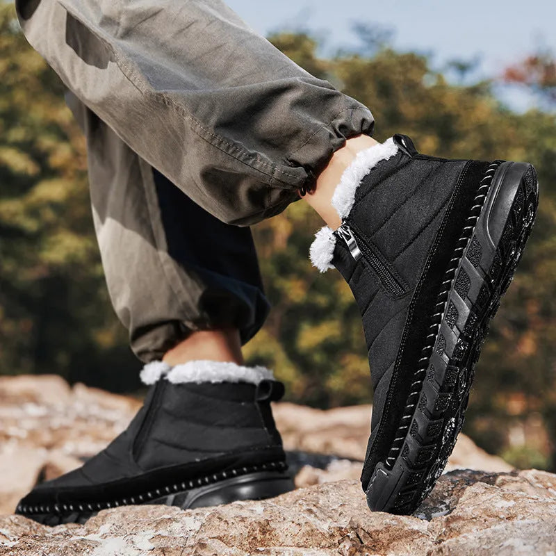 Men's plus size snow boot in a solid colour with cotton upper, flat heel, and non-slip rubber sole.